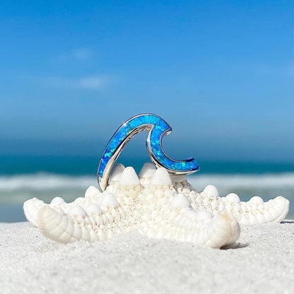 Silberner Wellenring mit blauem Opal