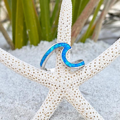 Silberner Wellenring mit blauem Opal