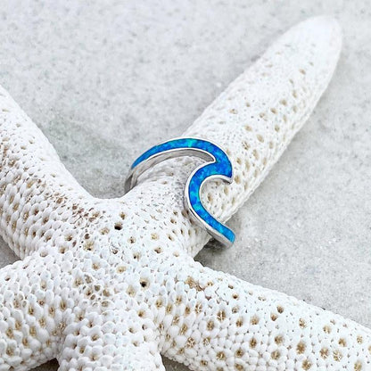 Silberner Wellenring mit blauem Opal